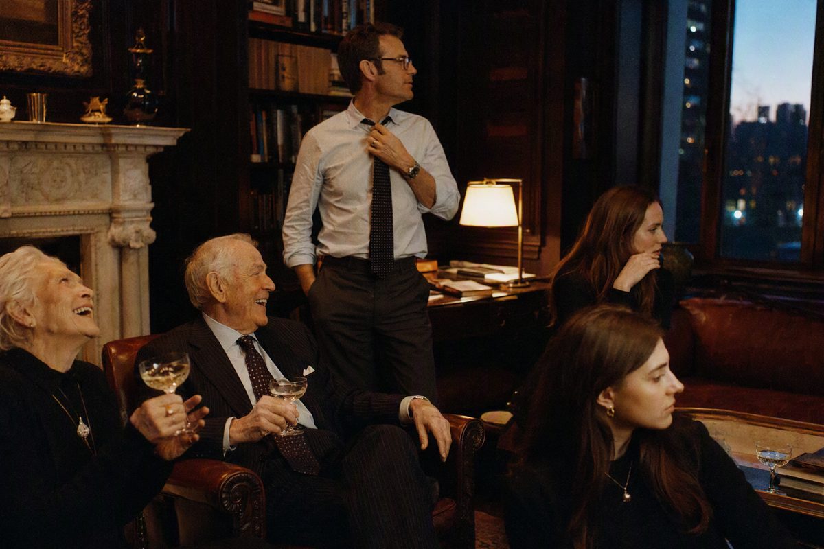 Family gathered in the library of their Upper East Side townhouse, New York
